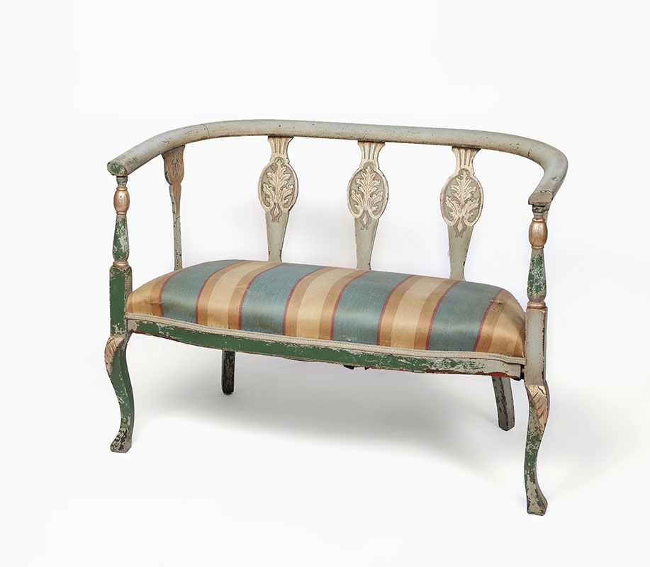 Appraisal: PAINT DECORATED SETTEE Early th century shaped top rail carved