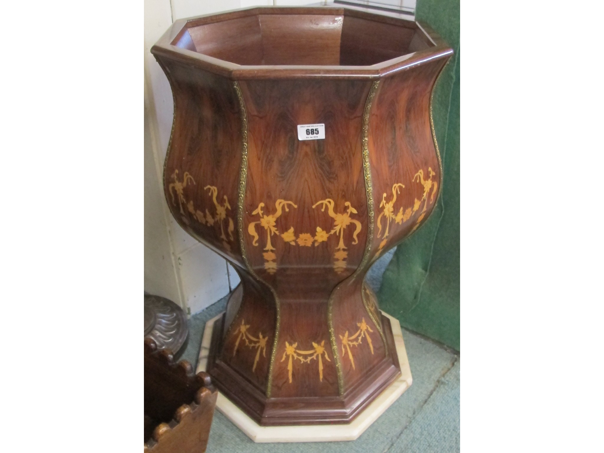 Appraisal: An octagonal inlaid jardiniere with brass decoration