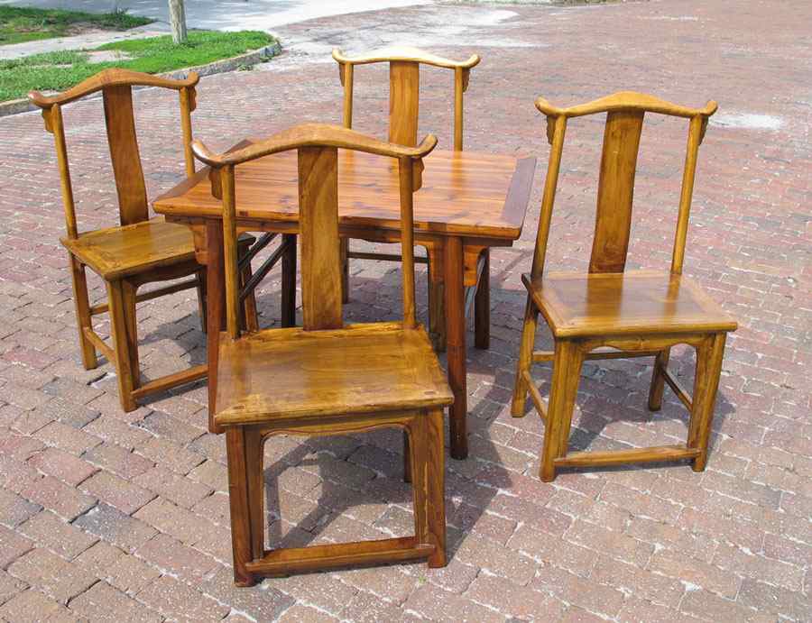 Appraisal: CHINESE ELMWOOD TABLE WITH YOKE BACK CHAIRS Table measures ''