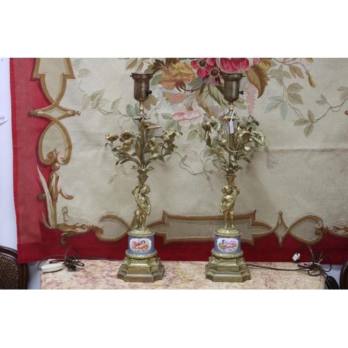 Appraisal: Pair of th century ormolu figural candelabras Sevres porcelain mounted