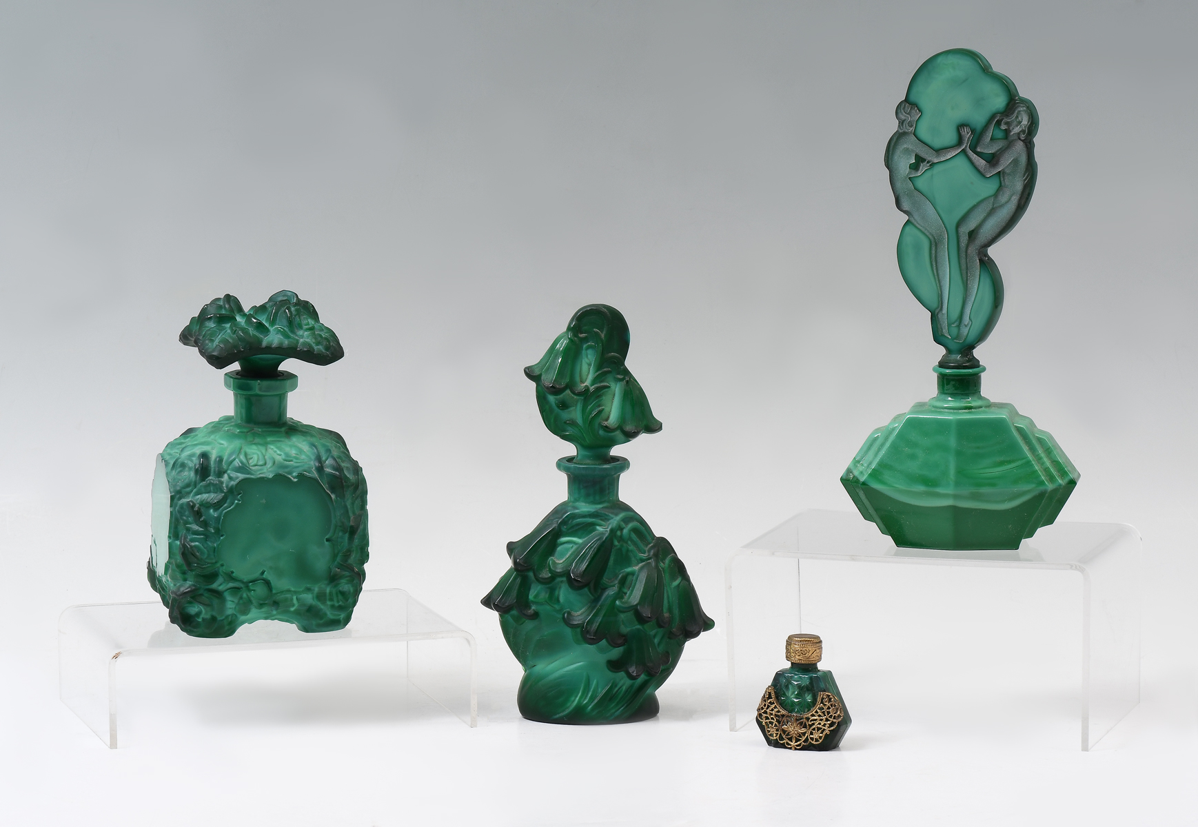 Appraisal: MALACHITE GLASS CZECH PERFUME BOTTLES Jade green malachite glass perfume