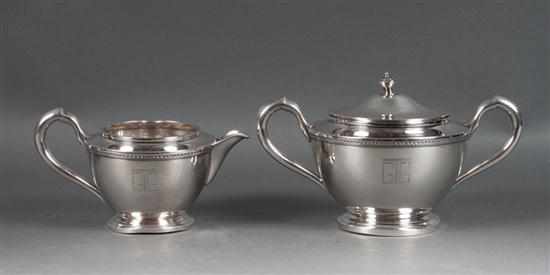 Appraisal: American sterling silver sugar bowl and cream pitcher in the