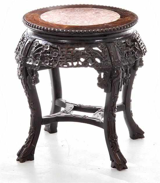 Appraisal: Chinese carved hardwood marbletop stand mid th century circular top