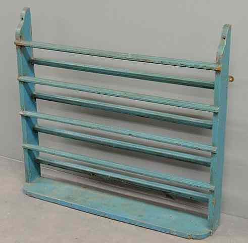 Appraisal: Blue painted hanging plate rack th c h x w