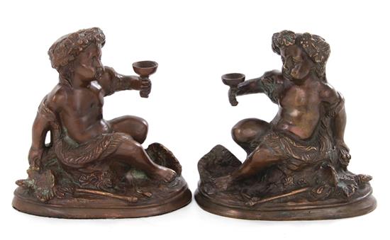 Appraisal: Pair bronze figures of putti holding wine cups H W