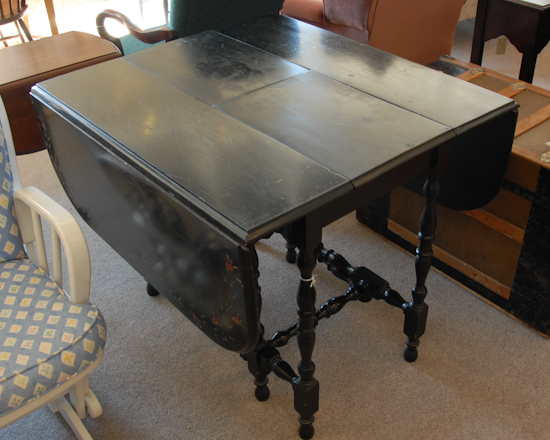 Appraisal: Black Painted Gate Leg Table with Floral Design Has leaf