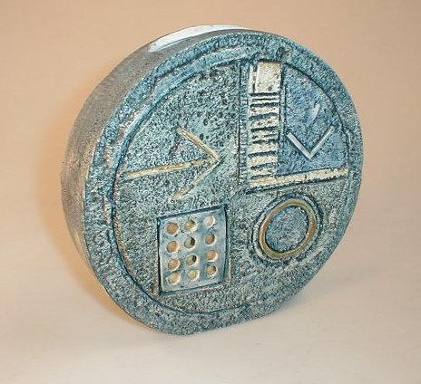 Appraisal: A Troika pottery wheel vase incised with geometric patterns against