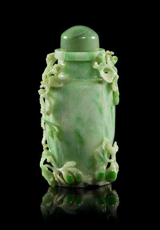 Appraisal: A Chinese Carved Jade Snuff Bottle of green and white