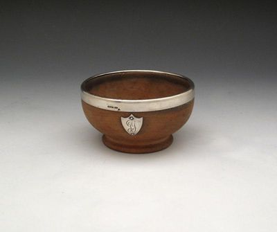 Appraisal: A Scottish provincial silver mounted mazer bowl maker's mark of