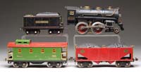 Appraisal: LIONEL STANDARD GAUGE LOCO W MATCHING TENDER TWO FREIGHT CARS