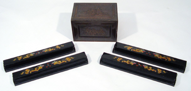 Appraisal: Chinese bone mahjong set with coloured decoration in a carved