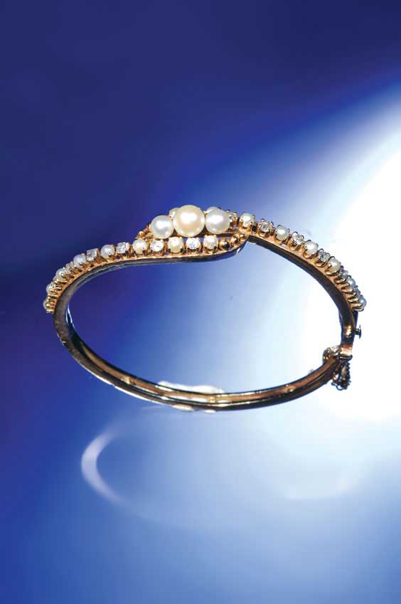 Appraisal: PEARL AND DIAMOND BRACELET K yellow gold cultured pearl and