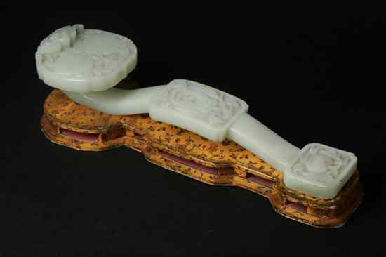 Appraisal: CHINESE CELADON JADE RUYI SCEPTRE Late th early th century