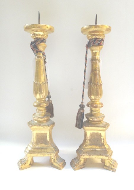 Appraisal: A pair of yellow giltwood altar candlesticks th century each