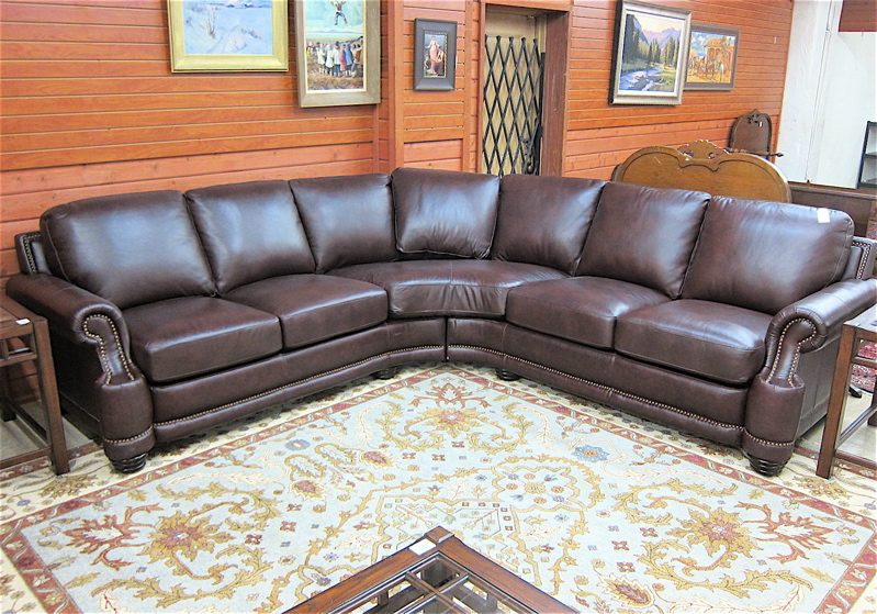 Appraisal: CONTEMPORARY BURGUNDY LEATHER SECTIONAL SOFA Leather Italia Co USA manufactured