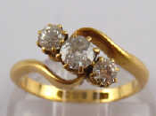 Appraisal: An carat gold old brilliant cut three stone diamond ring