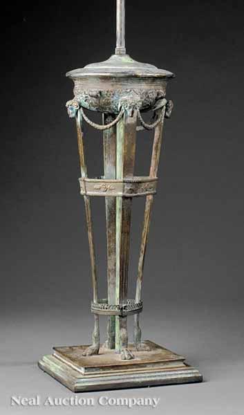 Appraisal: A Neoclassical-Style Patinated Metal Brazier-Form Table Lamp c the legs