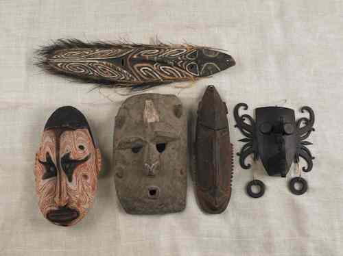 Appraisal: Five Borneo New Guinea carved and painted masks tallest -