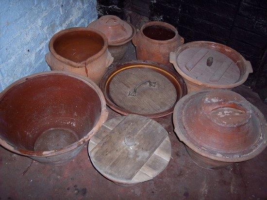 Appraisal: A quantity of terracotta storage jars crocks etc