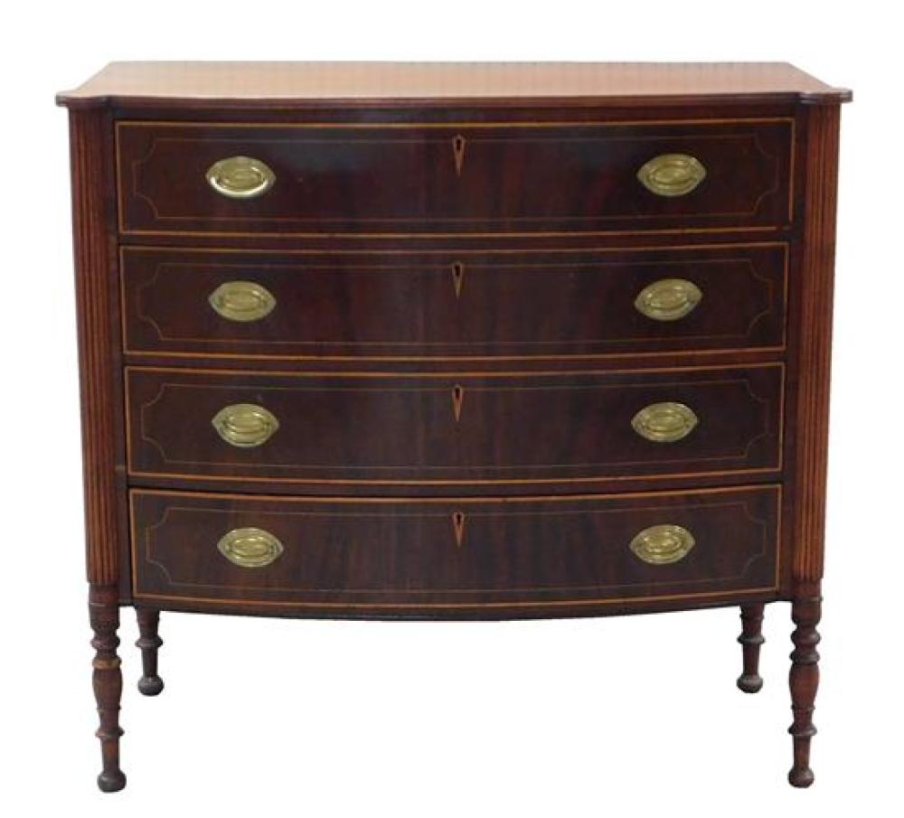 Appraisal: American Sheraton bowfront chest ovolo corners over reeded three-quarter columns