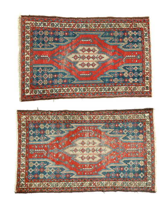 Appraisal: TWO ORIENTAL RUGS Maslaghans ca Very similar ''lightning'' designs in