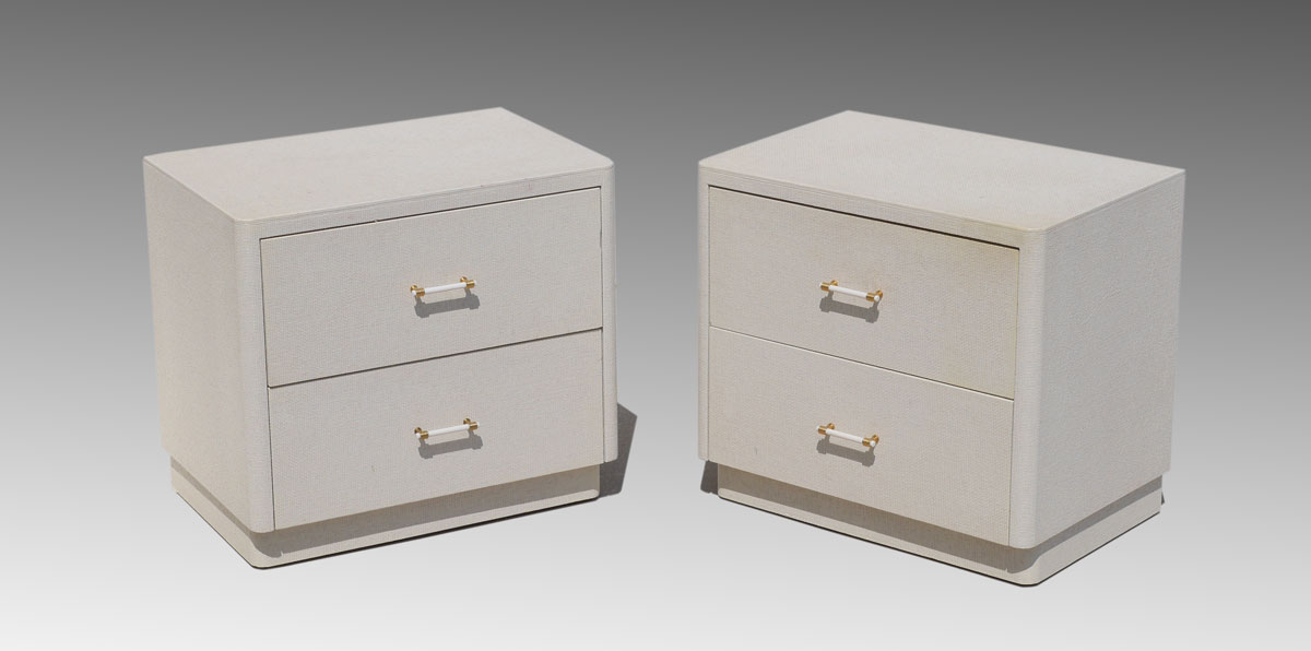 Appraisal: PAIR KARL SPRINGER GRASS CLOTH CABINETS Pair drawer cabinets clad