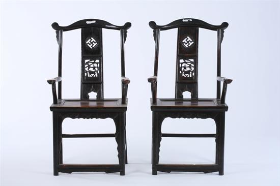 Appraisal: PAIR CHINESE ELMWOOD YOKE-BACK ARMCHAIRS Shanxi province th century -