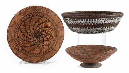 Appraisal: Two Native American coiled basketry bowls together with a beaded