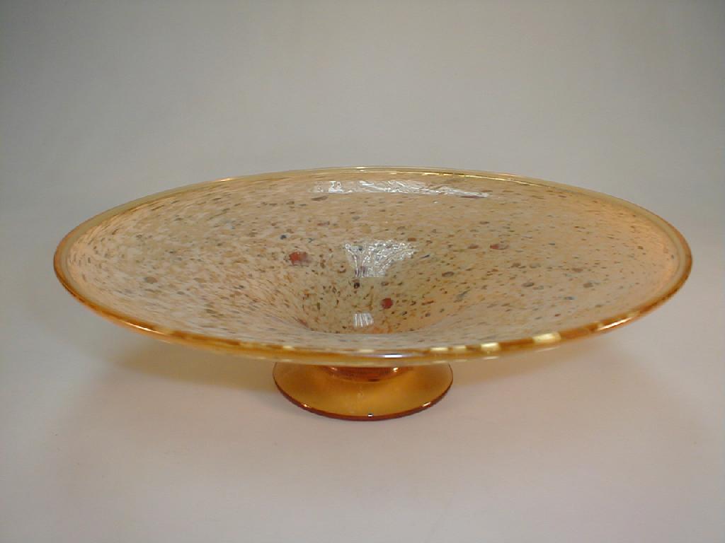 Appraisal: An amber and aventurine mottled glass circular comport on a