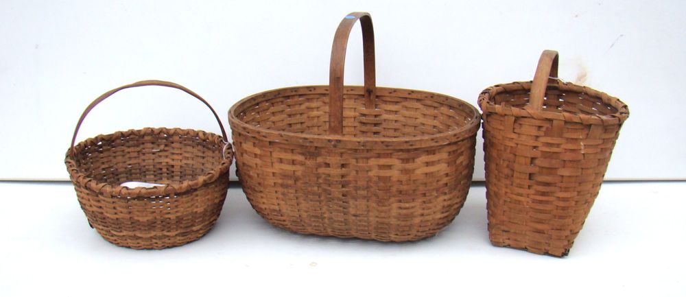 Appraisal: THREE SPLINTWORK BASKETS th CenturyOne oval and two circular Heights