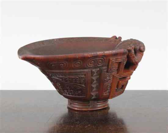 Appraisal: A fine Chinese rhinoceros horn archaistic libation cup th th