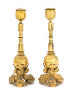 Appraisal: A Pair of Empire Gilt Metal Candlesticks Diameter of plaque