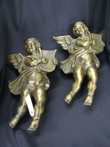 Appraisal: Pair of Bronze Figures of Cherubs with music lyres