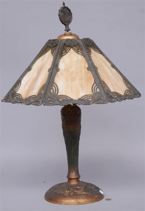 Appraisal: A BROWN SLAG GLASS TABLE LAMP Having reticulated decoration H