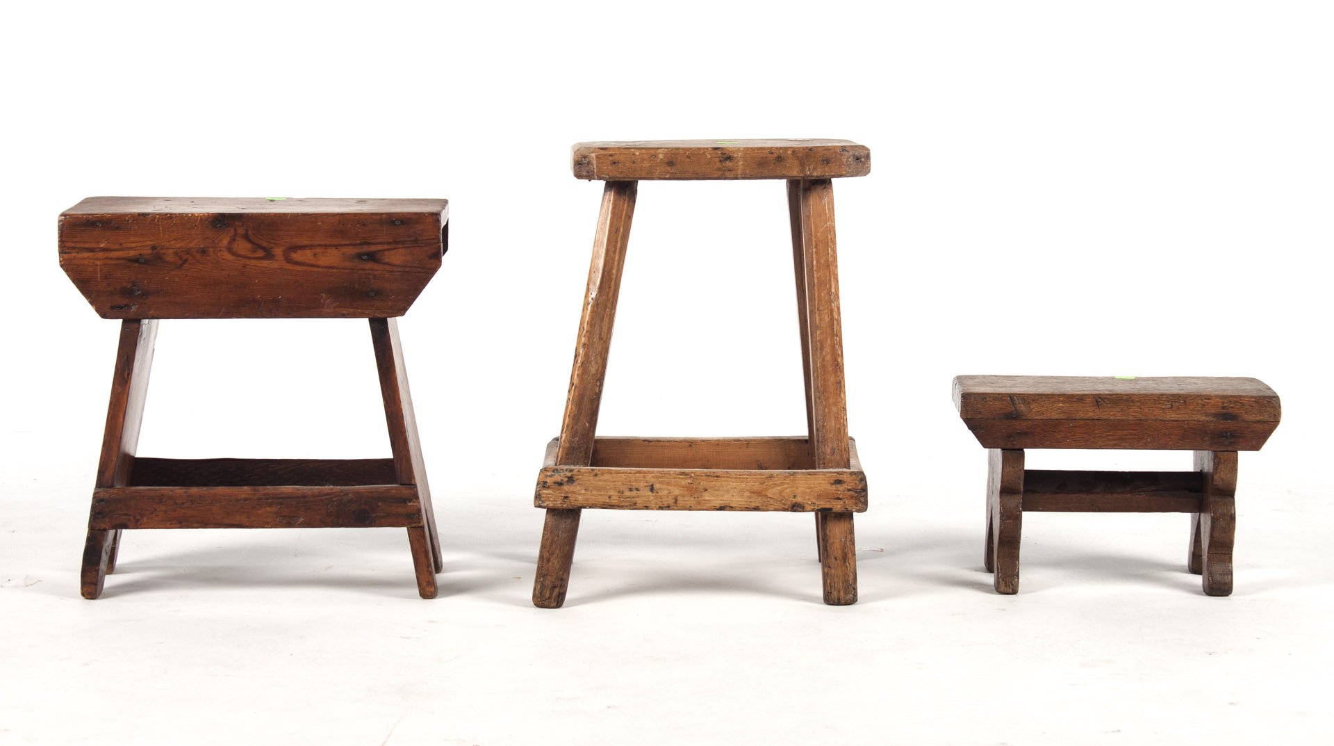 Appraisal: Three English Country stools th century or earlier deal oak