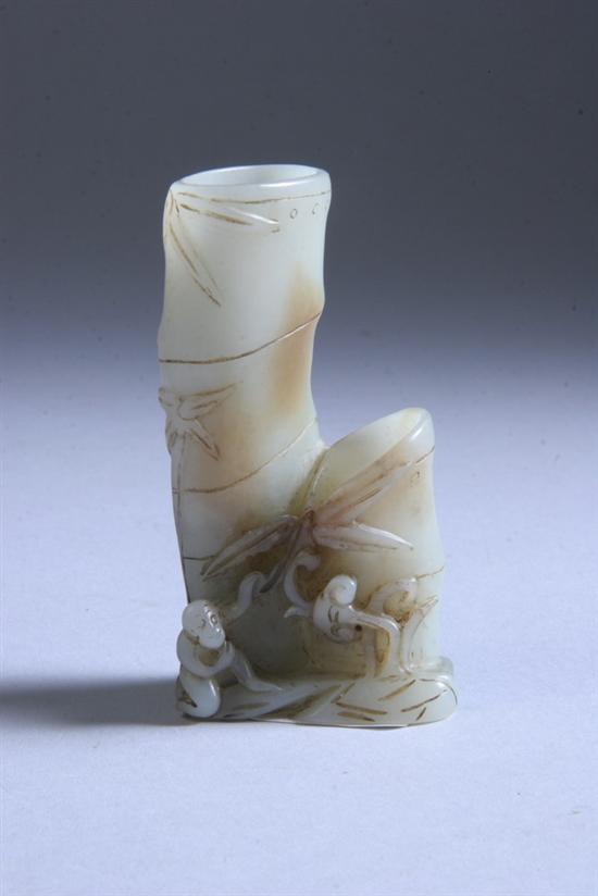 Appraisal: CHINESE JADE BRUSH HOLDER Qing dynasty Carved to depict two