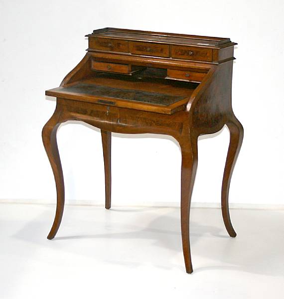 Appraisal: A Louis XVI style burl walnut veneered desk