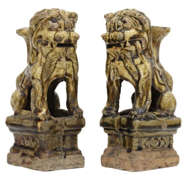 Appraisal: pair Chinese ceramic incense holders modeled as seated foo lions