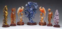 Appraisal: SEVEN CARVED STONE ORIENTAL FIGURES Lot includes blue lapis figure