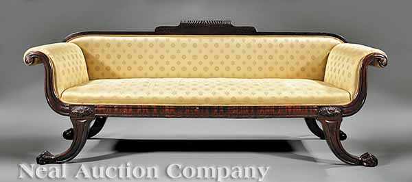 Appraisal: An American Classical Carved Mahogany Sofa th c with gadrooned