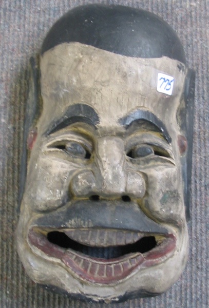 Appraisal: A CHINESE WOODEN THEATER MASK hand carved with traces of