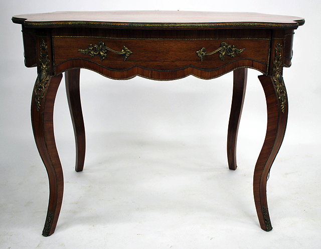 Appraisal: A TH CENTURY FRENCH KINGWOOD ROSEWOOD CROSS BANDED CENTRE TABLE