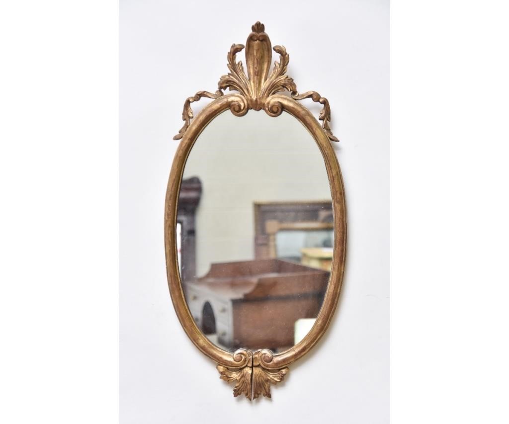 Appraisal: Italian gilt carved oval mirror early th c h x