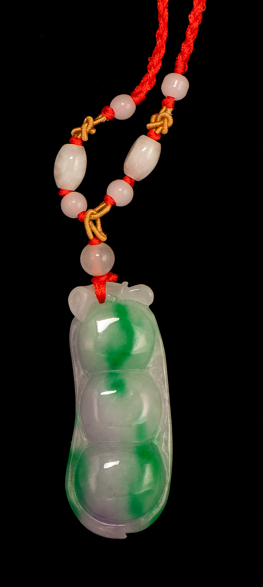 Appraisal: LAVENDER AND GREEN JADEITE PENDANT In the form of a