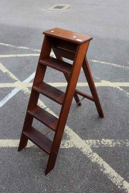 Appraisal: A SET OF FOLDING MAHOGANY STEPS approximately tall x wide