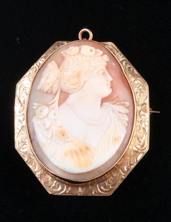 Appraisal: VICTORIAN K YELLOW GOLD AND CARVED SHELL CAMEO PENDANT BROOCH