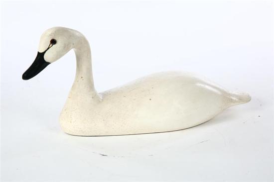 Appraisal: CARVED SWAN American th century wood Miniature carved whistling swan