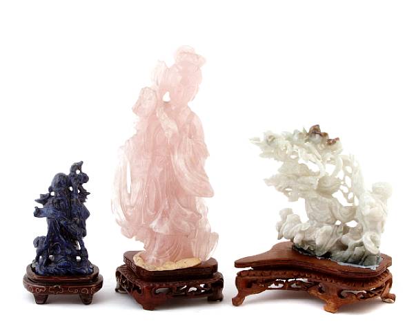 Appraisal: A group of three carved hardstone Asian figures height of