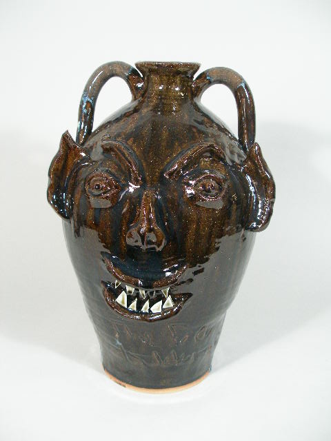 Appraisal: NC Folk Pottery Face Jug Ben Allman rich chocolate brown