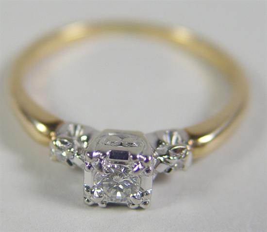 Appraisal: Ladies k Two-Tone Diamond Ring One approximate ct round brilliant